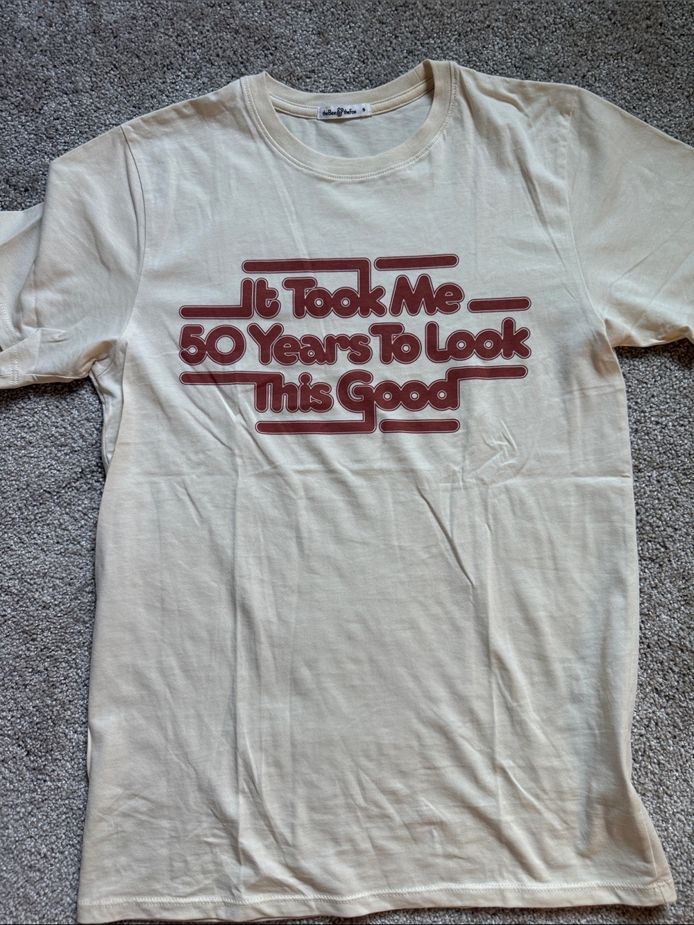 Vintage-Style Cream Graphic Tee "It Took Me 50 Years To Look This Good"